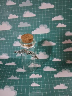 Empty 5cm glass memorial bottle with cork lid and silver angel wing charm