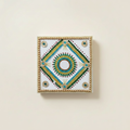 Square handmade journal with gold beaded frame and teal, green and gold bead mandala with mirror centre, on a clean cream background